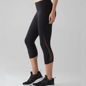 Lululemon 6 Train Times Crop (17") Black great pre owned condition, mesh detail